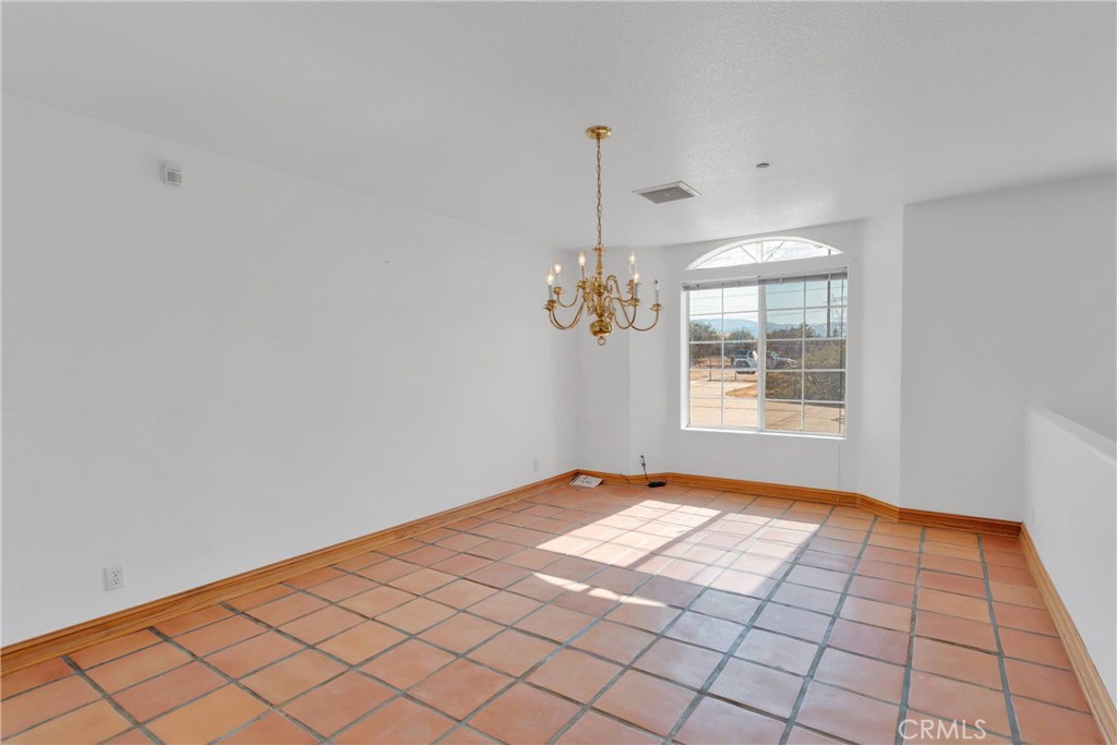 8381 White Road Phelan, CA 92371 - Photo 10 of 59 a view of an empty room and window