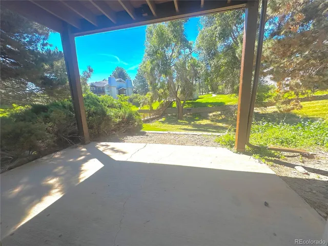 a view of a porch with a yard