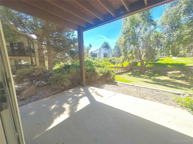 a view of a porch with a yard