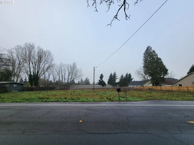 a view of road and trees