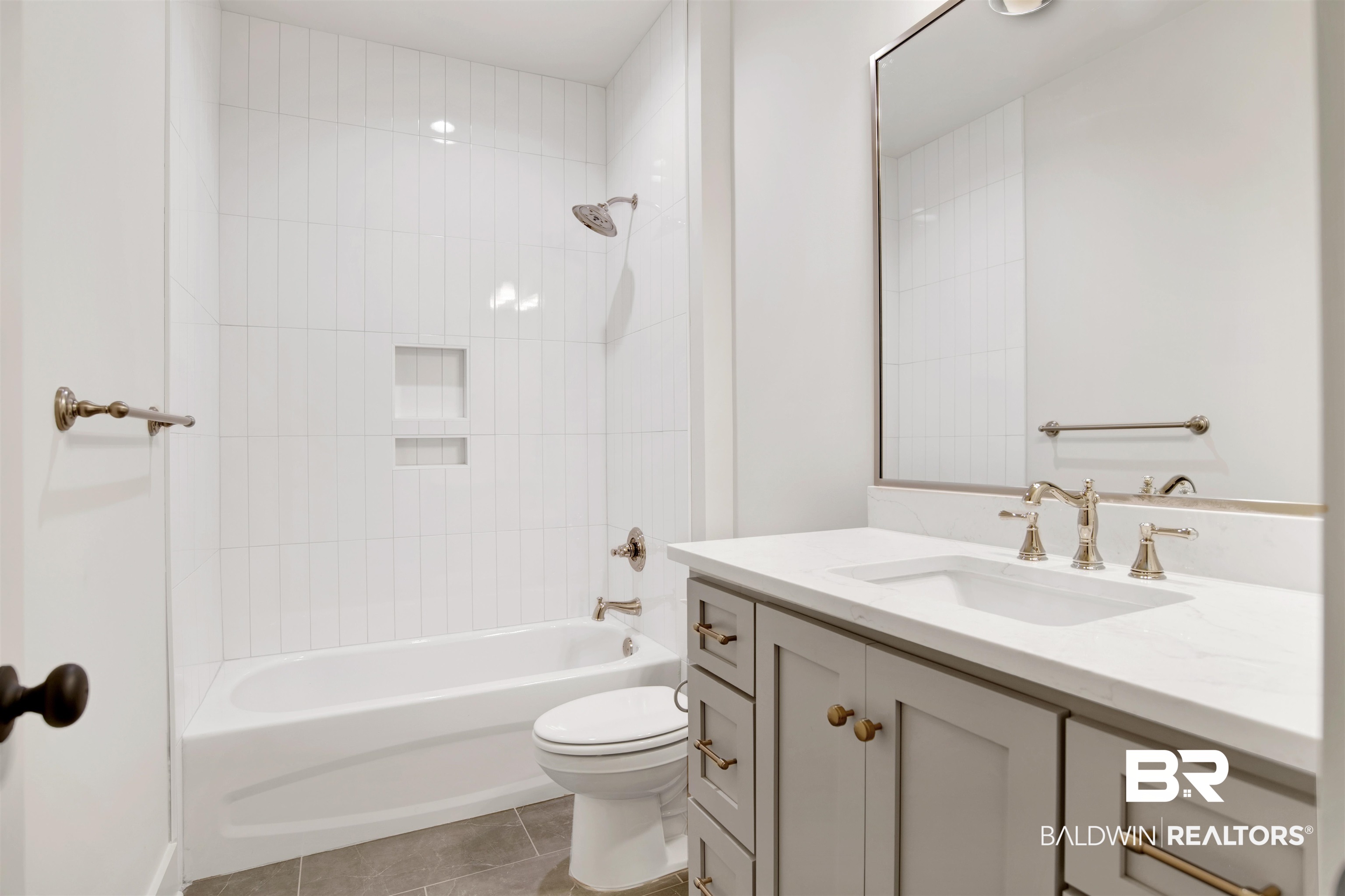 9275 Clarke Ridge Road Foley, AL 36535 - Photo 31 of 43 Bathroom featuring vanity, toilet, tile patterned flooring, and shower / bathtub combination