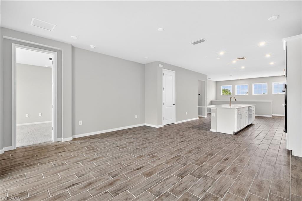 4646 Arboretum Circle, Unit 202 Naples, FL 34112 - Photo 9 of 25 Open Living Area