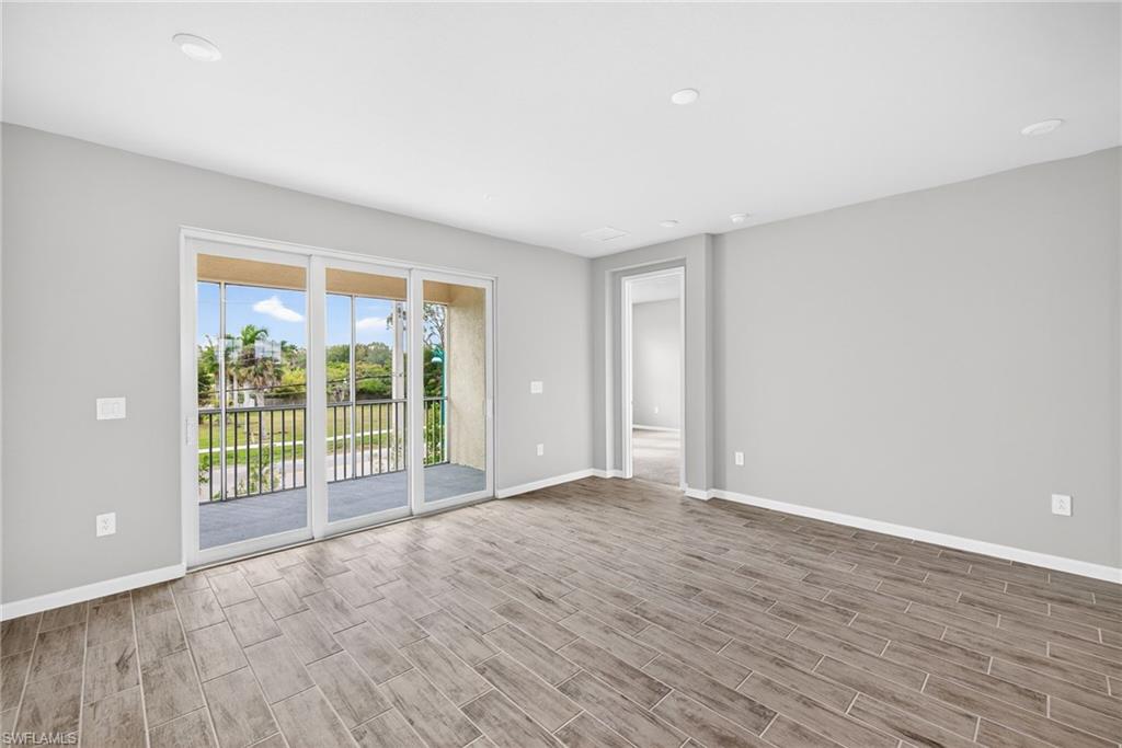 4646 Arboretum Circle, Unit 202 Naples, FL 34112 - Photo 11 of 25 Open Living Area