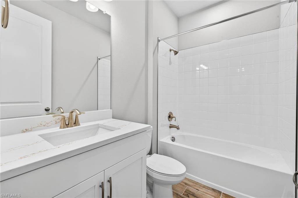 4646 Arboretum Circle, Unit 202 Naples, FL 34112 - Photo 19 of 25 Guest Bathroom