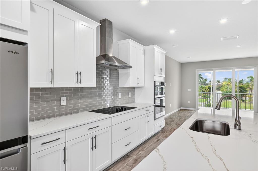 4646 Arboretum Circle, Unit 202 Naples, FL 34112 - Photo 6 of 25 Kitchen