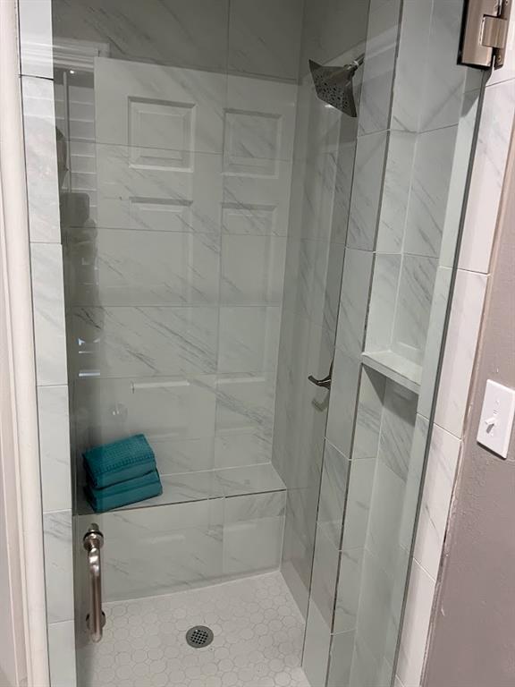 4206 Somerville Avenue Dallas, TX 75206 - Photo 20 of 26 a bathroom with a shower