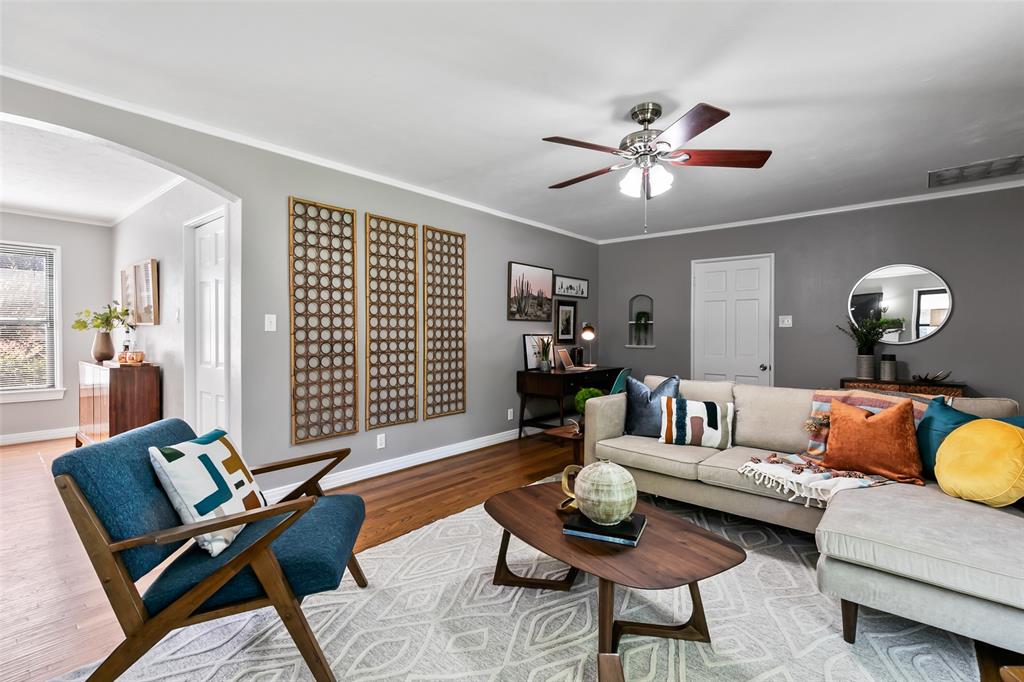 4206 Somerville Avenue Dallas, TX 75206 - Photo 3 of 26 a living room with furniture and wooden floor