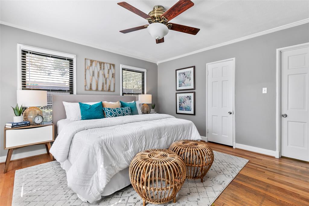 4206 Somerville Avenue Dallas, TX 75206 - Photo 10 of 26 a bedroom with a bed and dresser