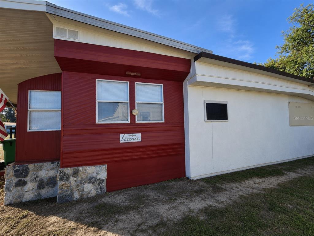 3074 Larkin Road Mims, FL 32754 - Photo 13 of 15 a view of a house with a yard