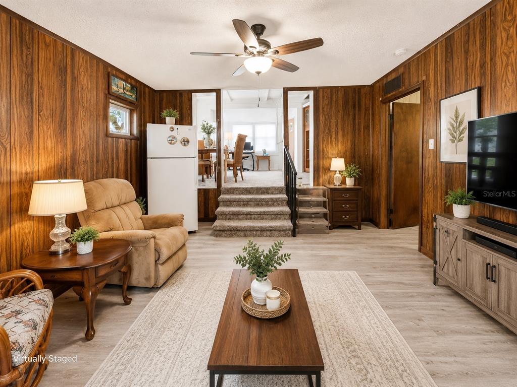 3074 Larkin Road Mims, FL 32754 - Photo 3 of 15 a living room with furniture and a flat screen tv