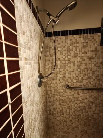 a view of a livingroom with furniture and a window