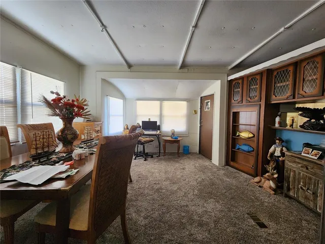 a kitchen with a sink stove and refrigerator