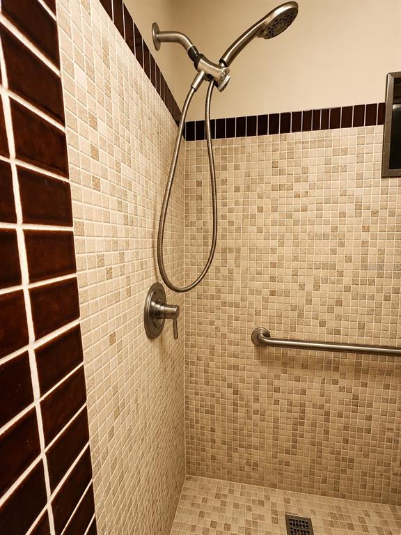 3074 Larkin Road Mims, FL 32754 - Photo 10 of 15 a bathroom with a shower