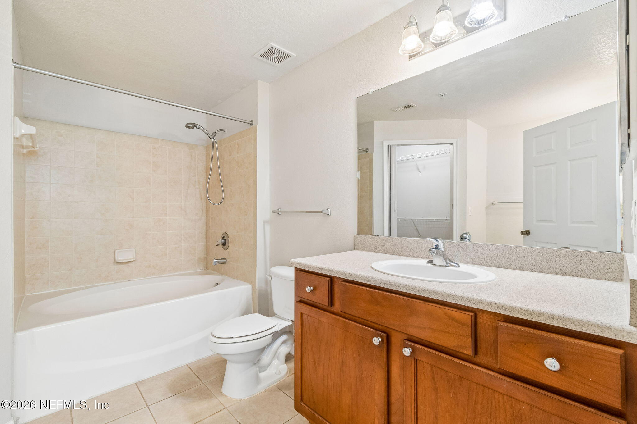 8550 Touchton Road, Unit 511 Jacksonville, FL 32216 - Photo 29 of 63 a bathroom with a sink a toilet and shower