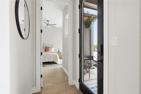 a spacious bathroom with a double vanity sink a mirror and a bathtub