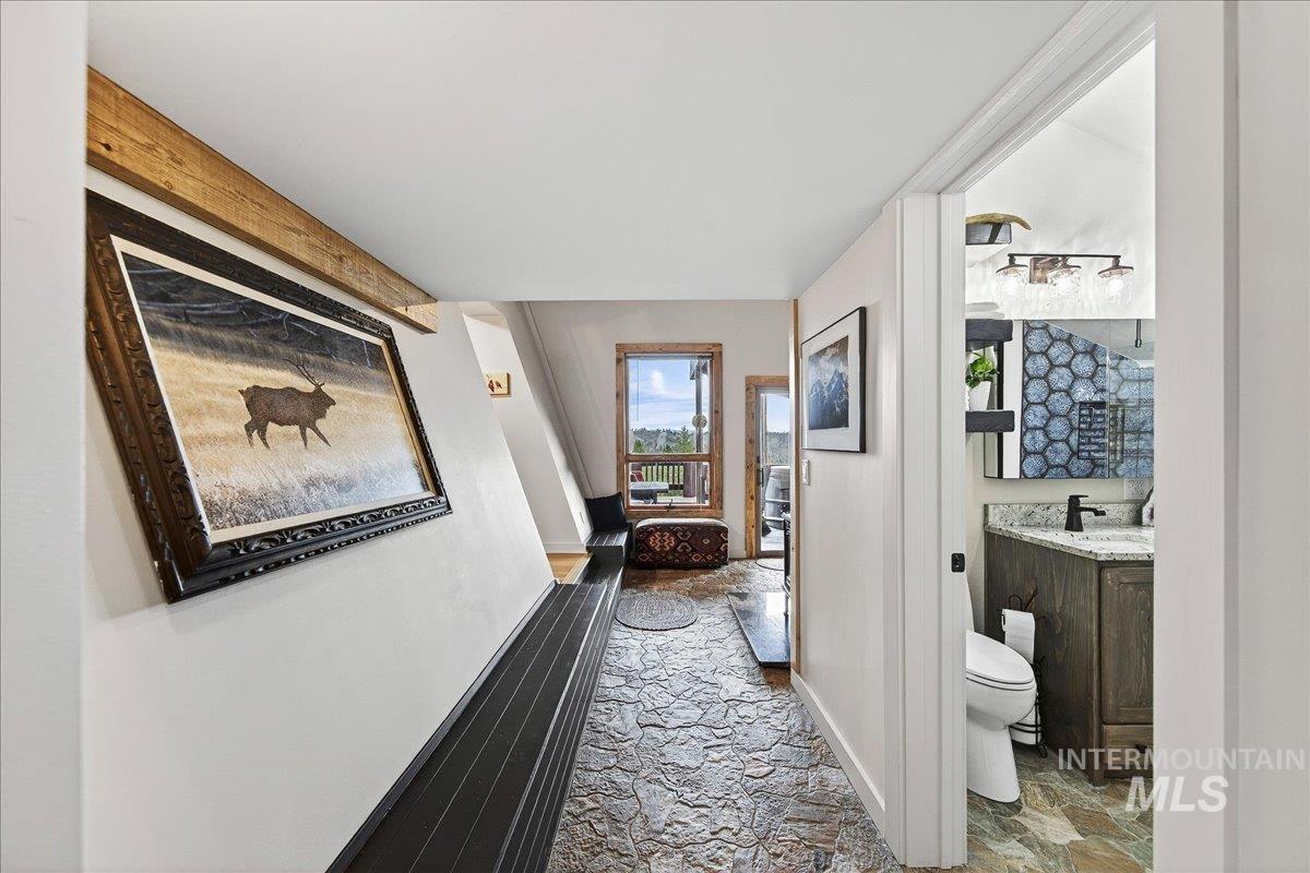 239 Tollgate Road Boise, ID 83716 - Photo 20 of 50 Hall with light stone finish flooring and baseboards