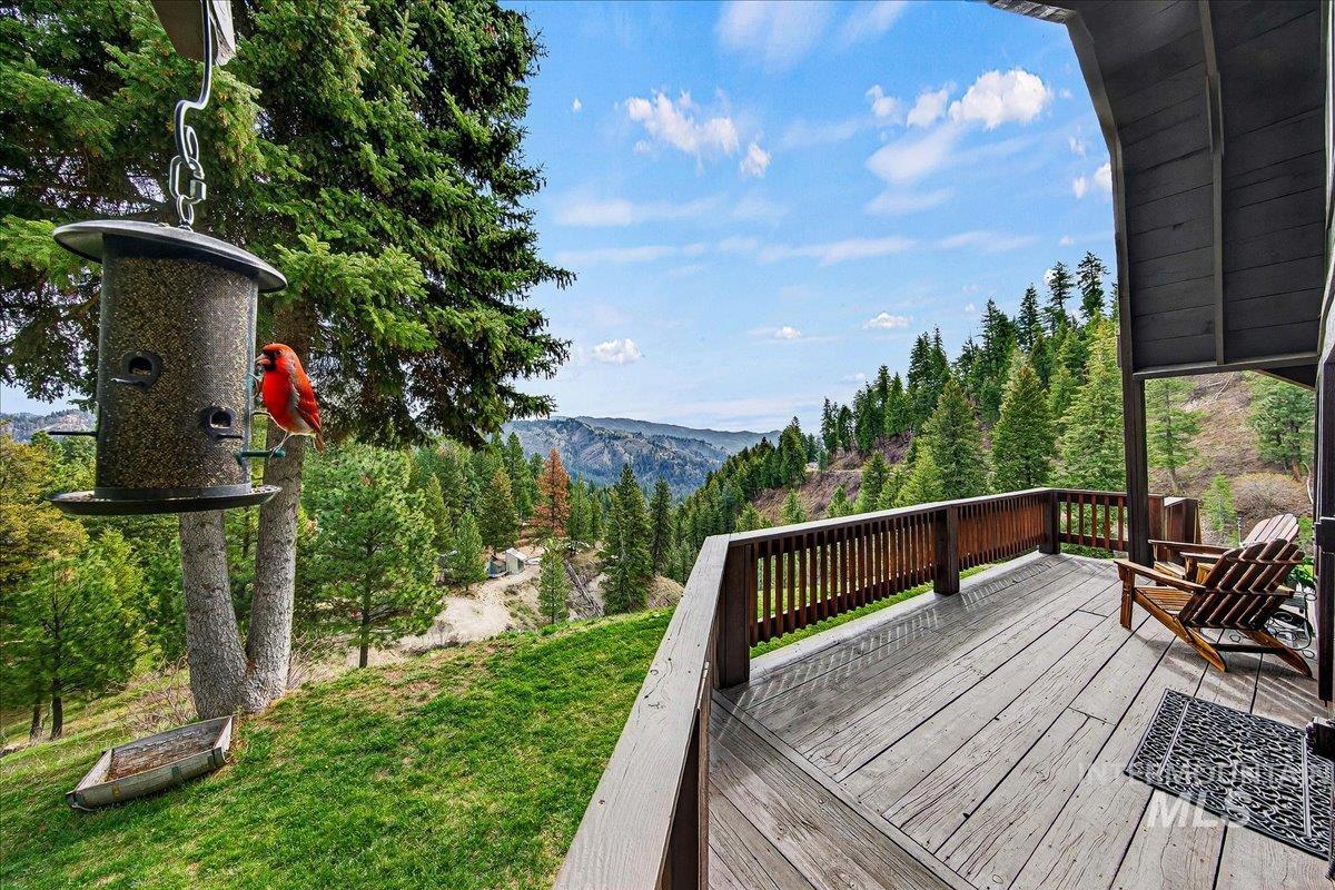 239 Tollgate Road Boise, ID 83716 - Photo 21 of 50 Wooden deck featuring a lawn