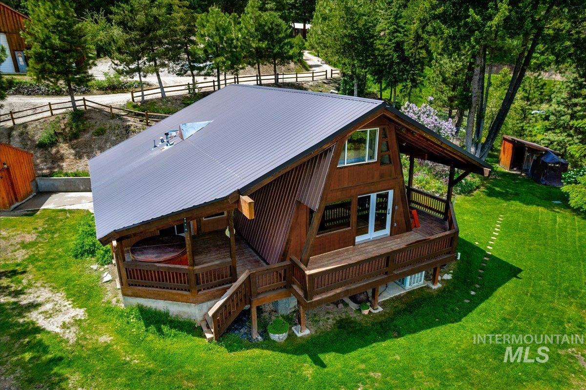 239 Tollgate Road Boise, ID 83716 - Photo 24 of 50 Exterior space featuring a metal roof and a deck