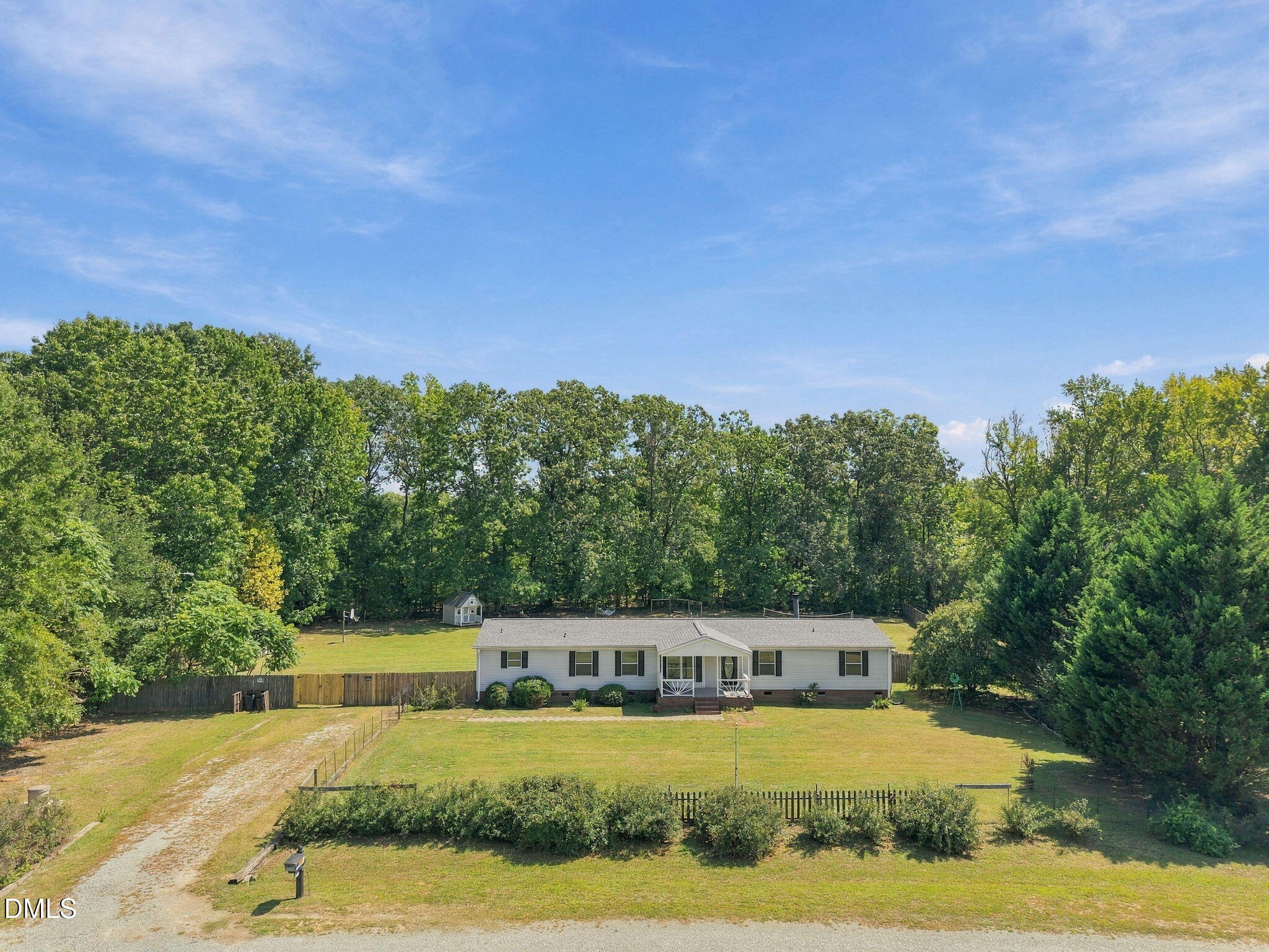 196 Dustin Lane Roxboro, NC 27574 - Photo 2 of 38 Private 1.46 acre oasis backing to woods