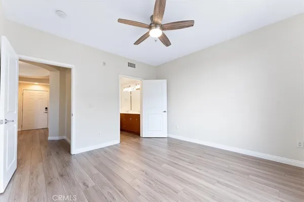 a bathroom with a double vanity sink mirror and shower