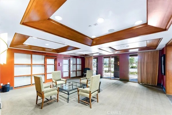 a view of a building with sitting area