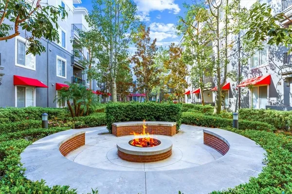 an outdoor space with patio lots of white furniture and outdoor view