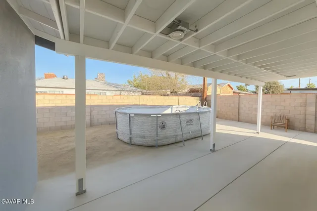 a view of a room with a large window