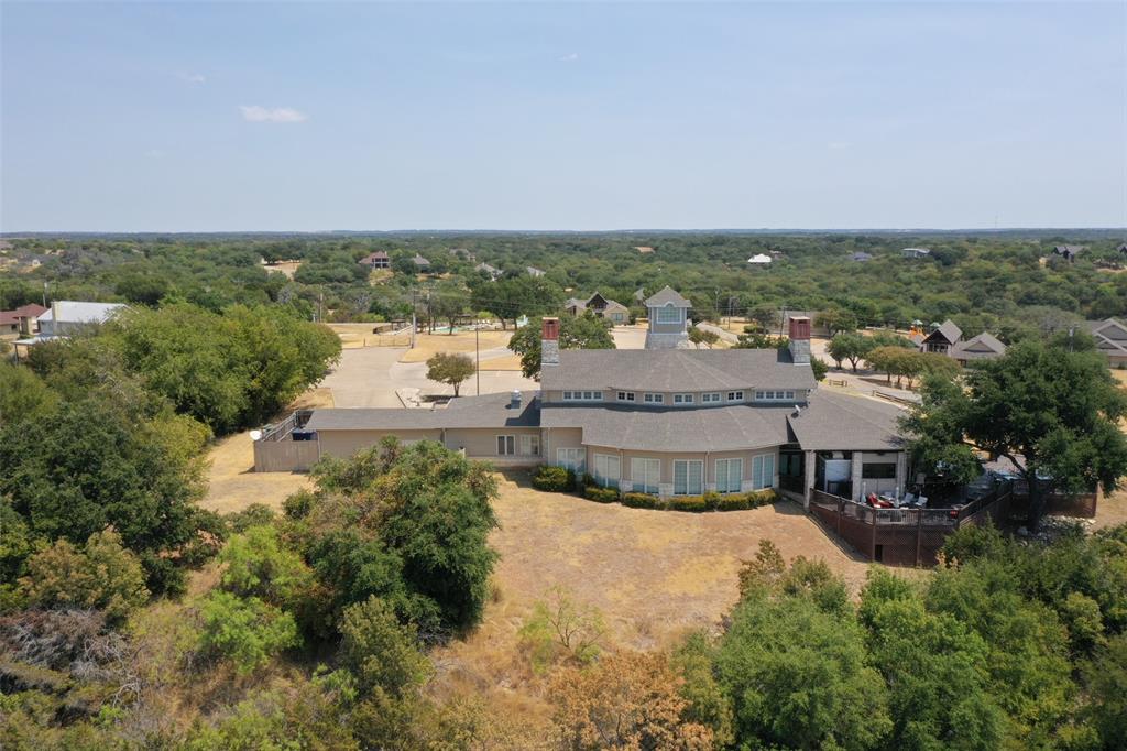 39345 Cedar Trail Whitney, TX 76692 - Photo 12 of 39 an aerial view of residential houses with outdoor space and trees