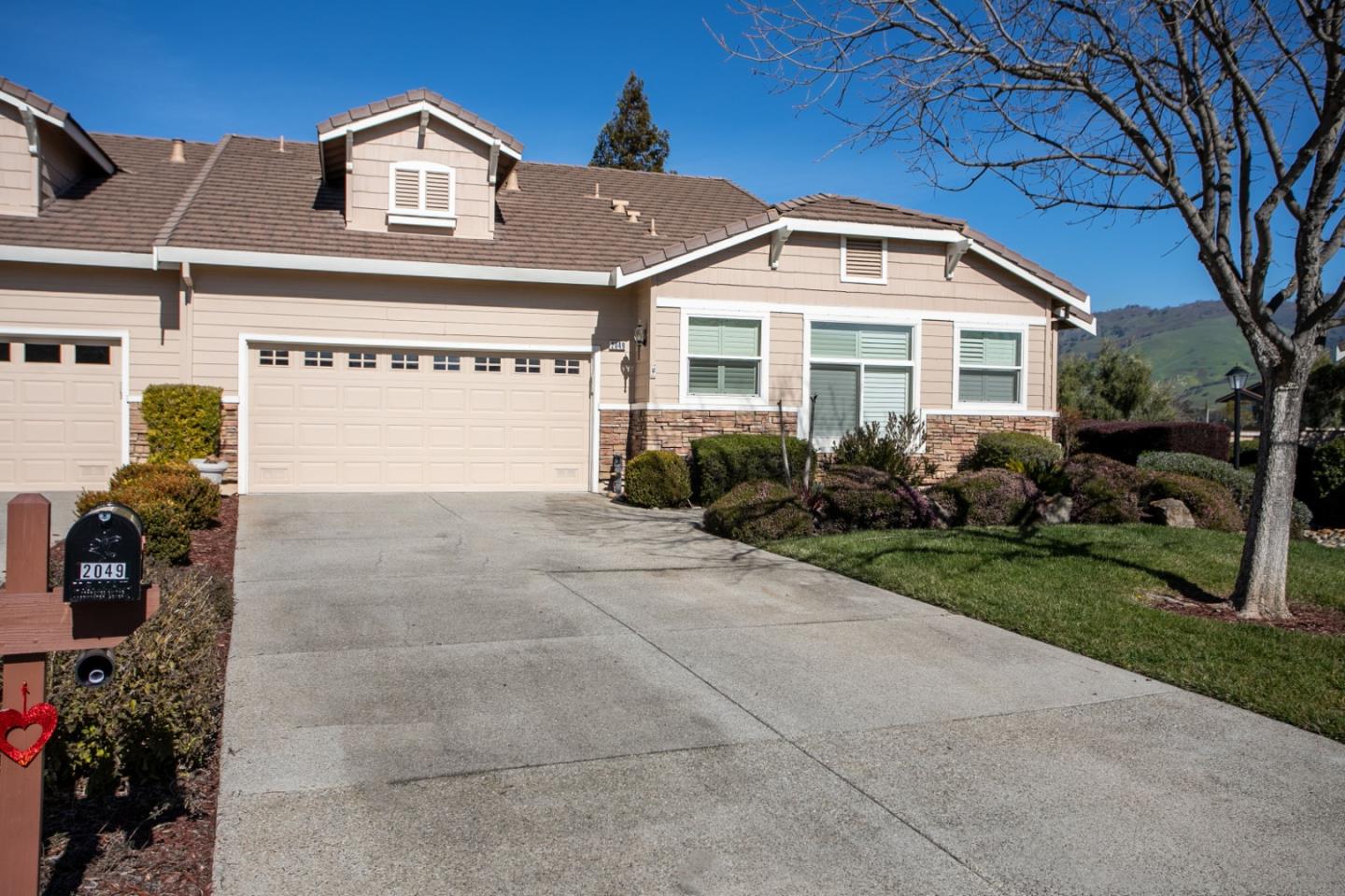2049 Folle Blanche Drive San Jose, CA 95135 - Photo 1 of 42 a front view of a house with garden