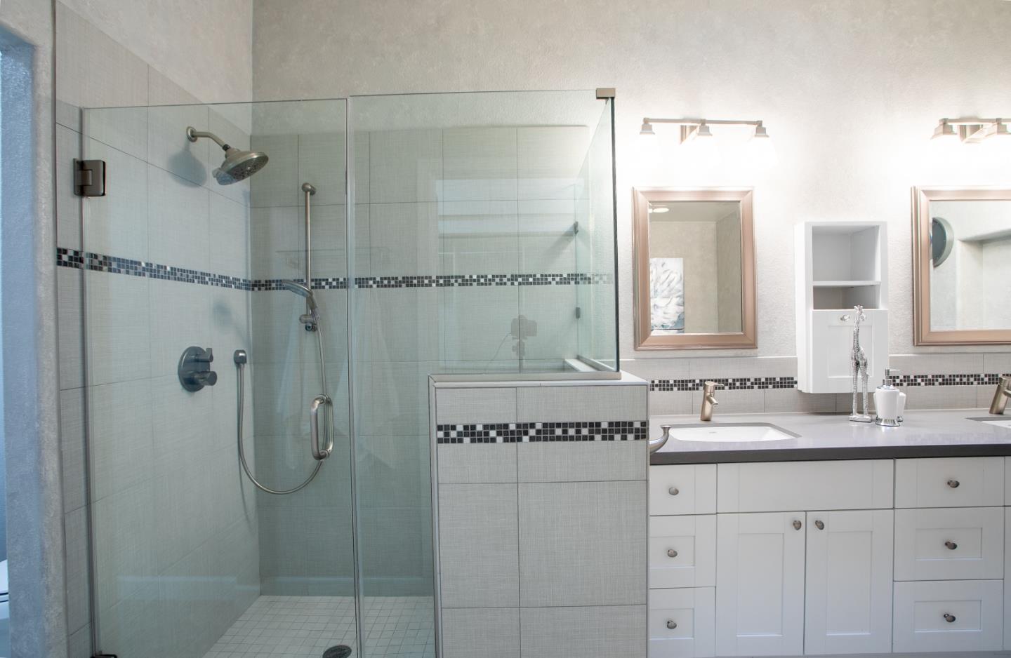 2049 Folle Blanche Drive San Jose, CA 95135 - Photo 15 of 42 a bathroom with a granite countertop sink a mirror and a shower