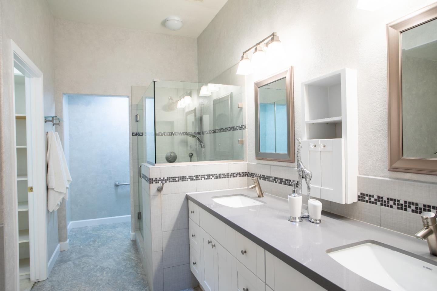 2049 Folle Blanche Drive San Jose, CA 95135 - Photo 16 of 42 a bathroom with a sink and a mirror
