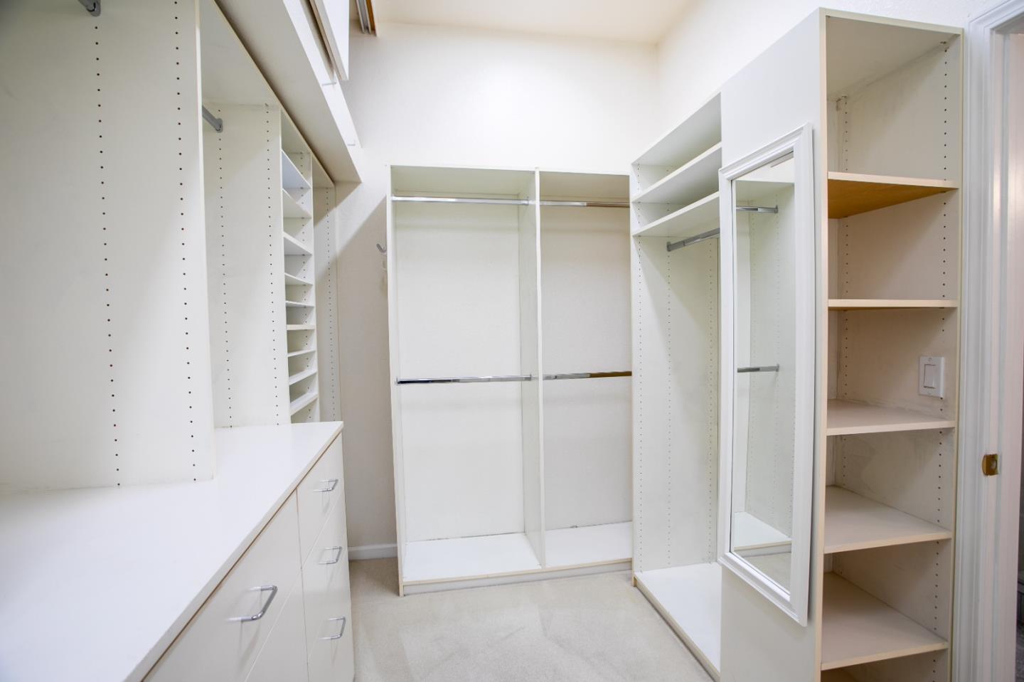 2049 Folle Blanche Drive San Jose, CA 95135 - Photo 17 of 42 a view of walk in closet with empty racks
