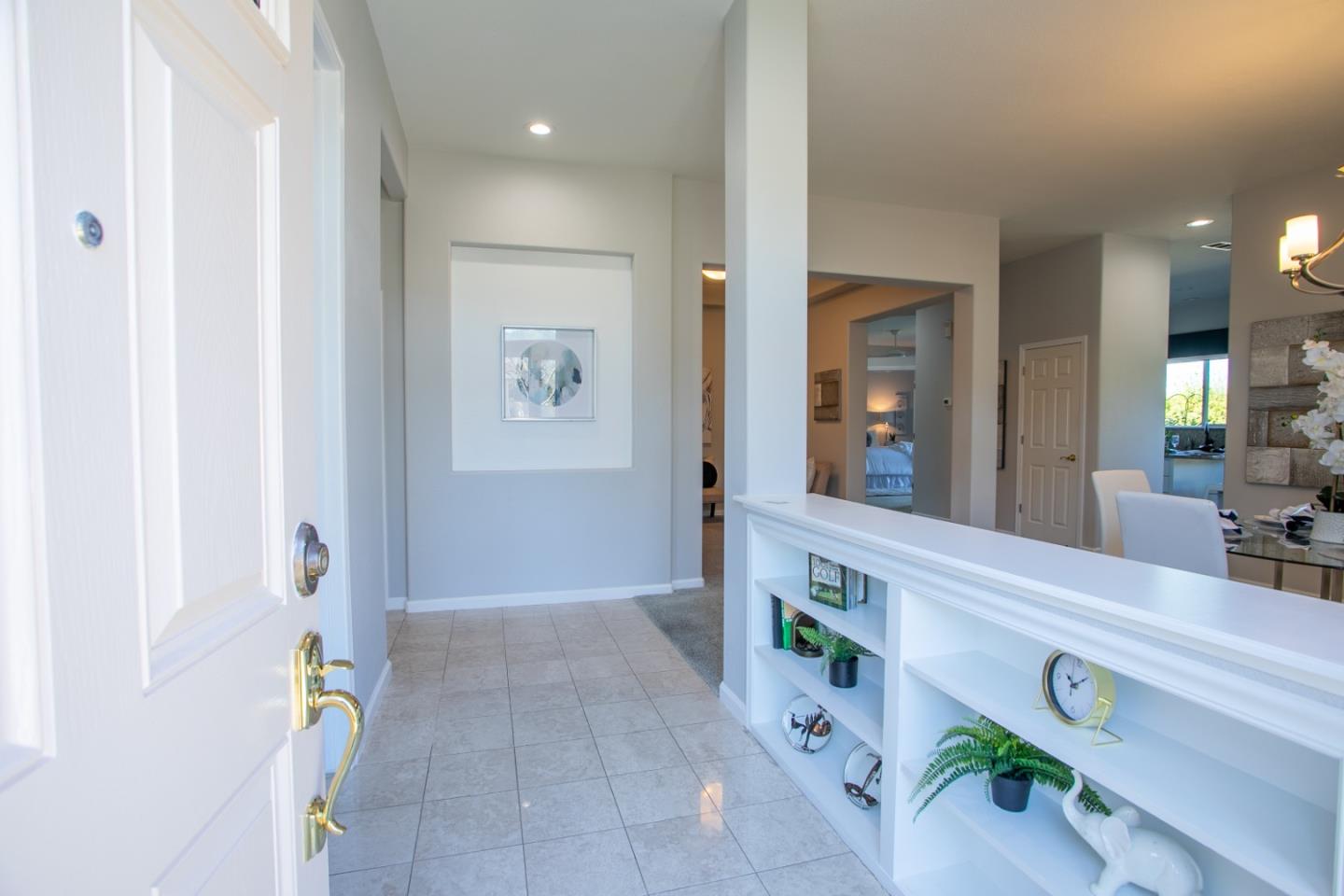 2049 Folle Blanche Drive San Jose, CA 95135 - Photo 2 of 42 a bathroom with a sink a mirror and a bathtub