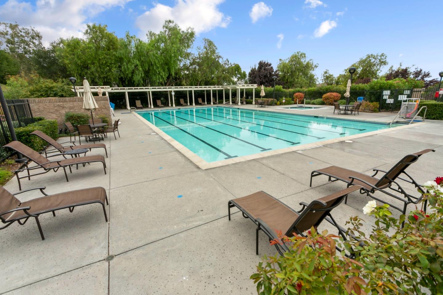 2049 Folle Blanche Drive San Jose, CA 95135 - Photo 33 of 42 a view of a swimming pool with a lounge chair