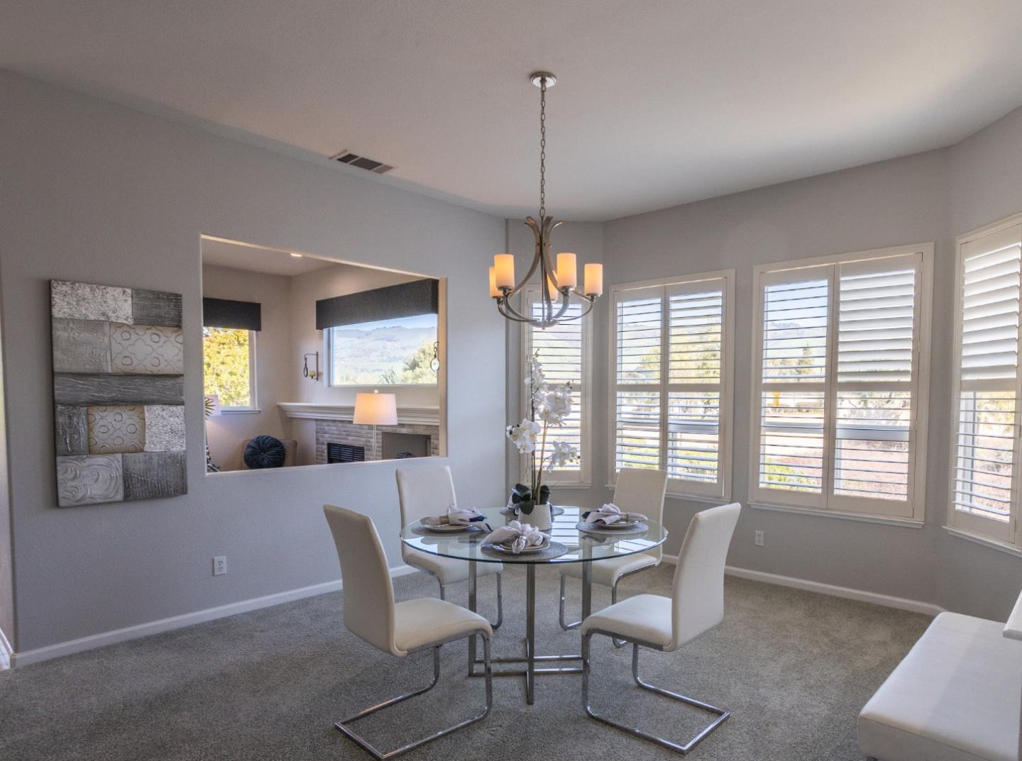 2049 Folle Blanche Drive San Jose, CA 95135 - Photo 6 of 42 a dining room with furniture a chandelier and window