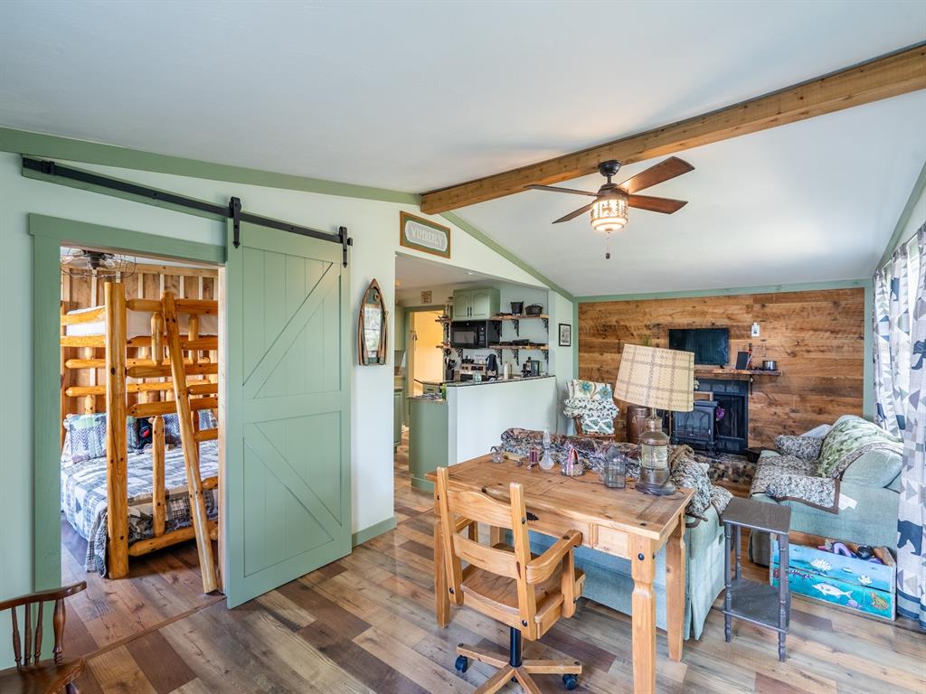 24855 Northeast 135th Street Salt Springs, FL 32134 - Photo 27 of 53 a dining room with furniture and window