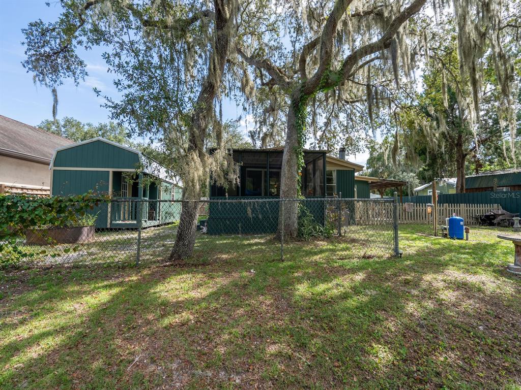 24855 Northeast 135th Street Salt Springs, FL 32134 - Photo 47 of 53 a view of a house with backyard