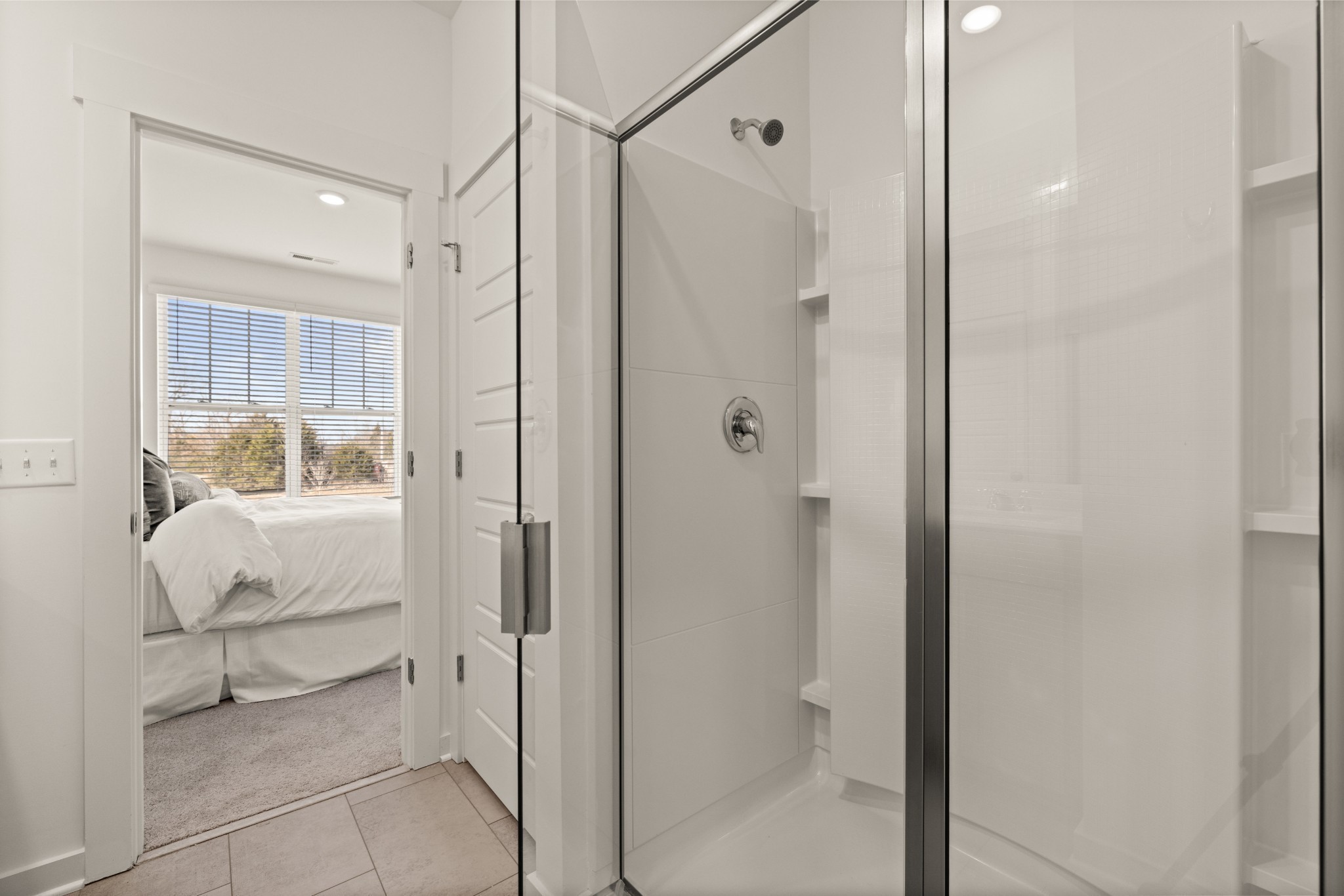 453 Alcott Way Spring Hill Spring Hill, TN 37174 - Photo 10 of 19 a bathroom with a glass shower door and a sink