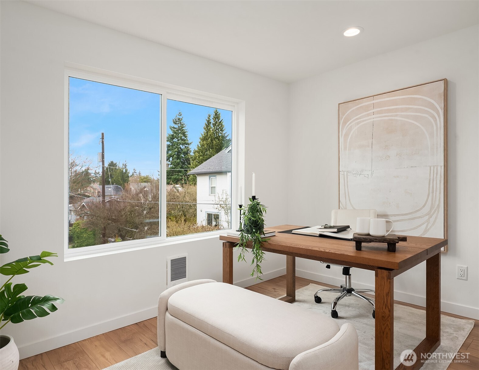223 Northeast 75th Street Seattle, WA 98115 - Photo 19 of 33 a living room with furniture and a window