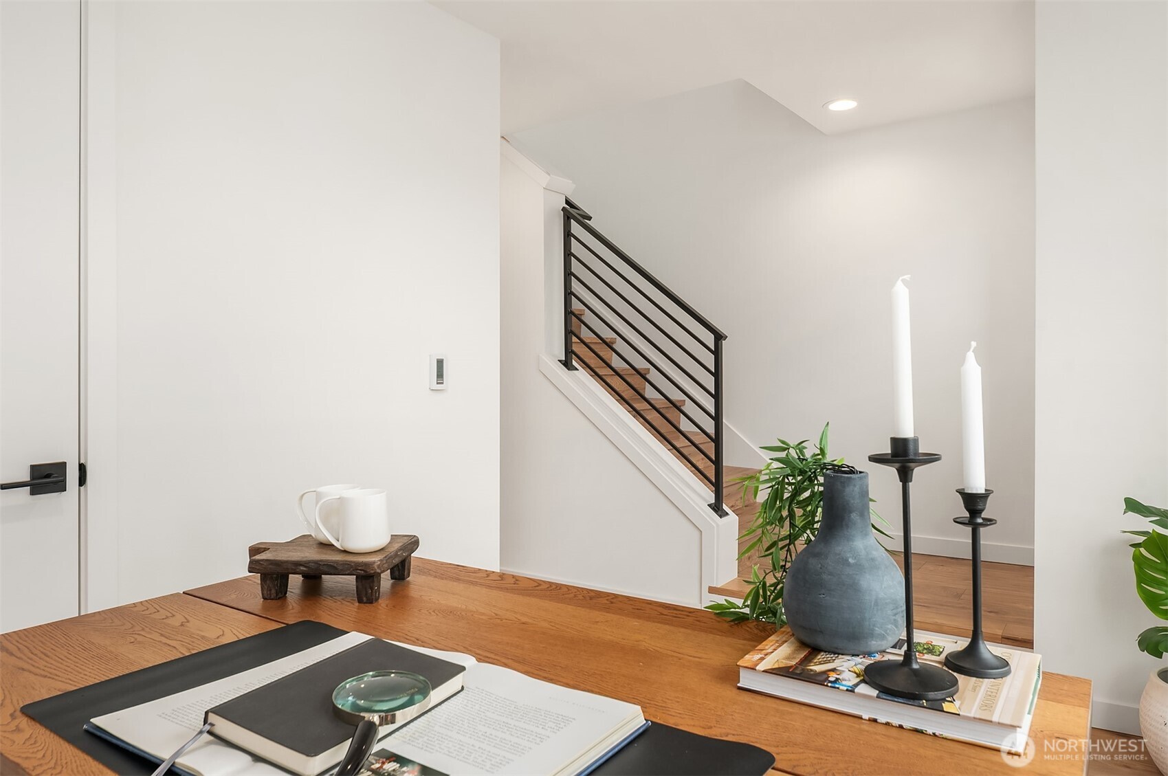 223 Northeast 75th Street Seattle, WA 98115 - Photo 21 of 33 a living room with furniture and wooden floor