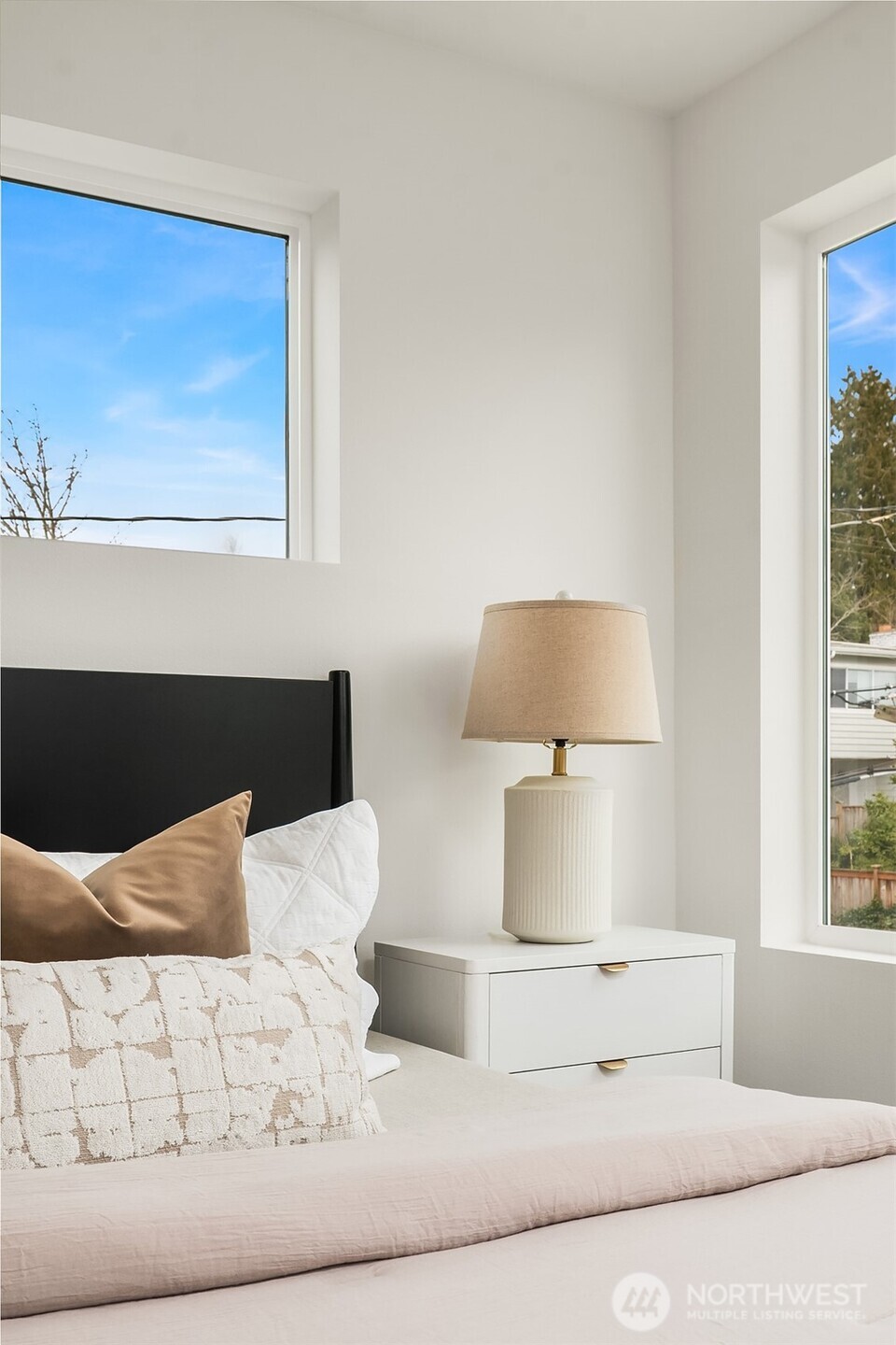 223 Northeast 75th Street Seattle, WA 98115 - Photo 23 of 33 a bed room with a bed and a night stand