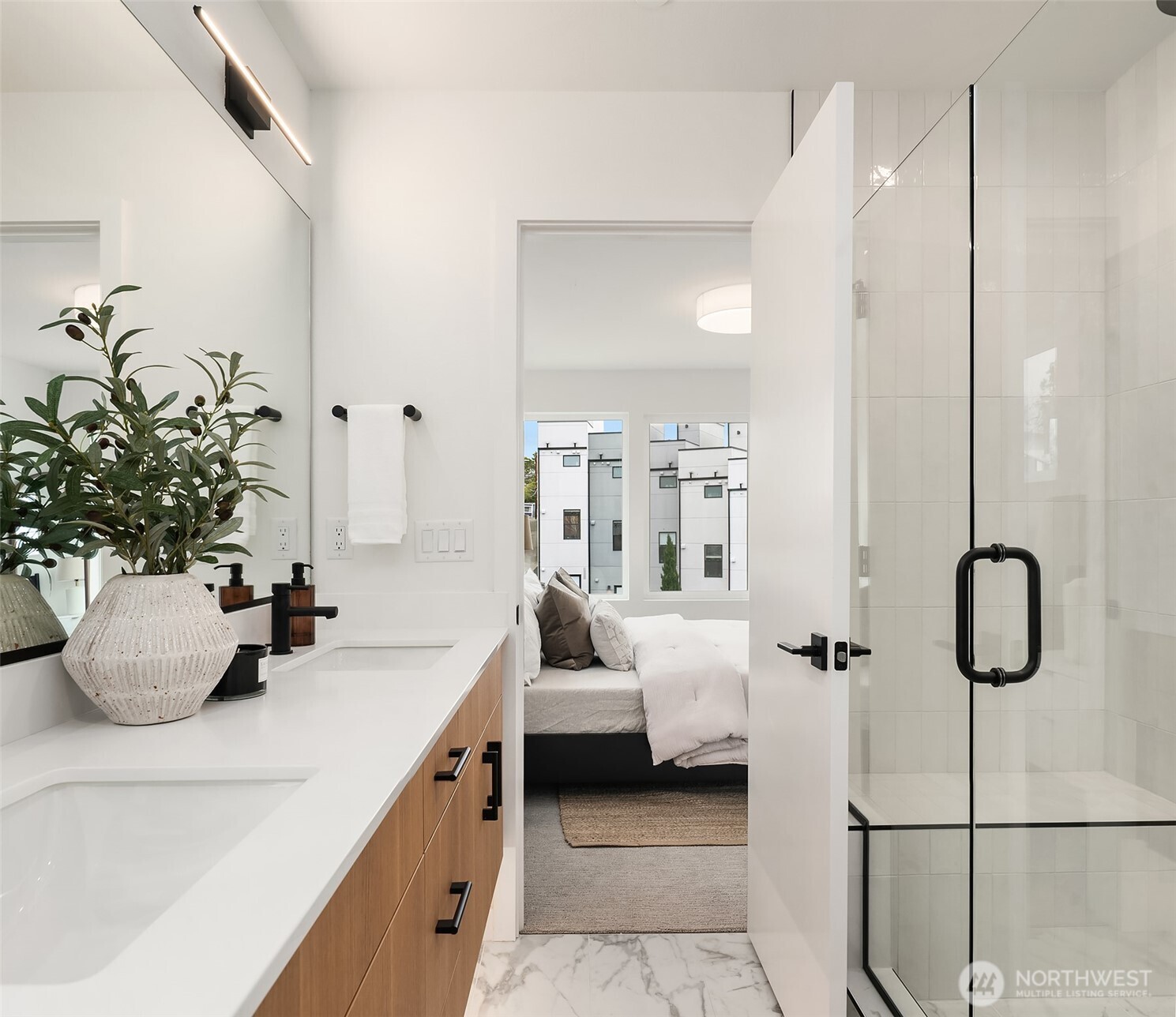 223 Northeast 75th Street Seattle, WA 98115 - Photo 27 of 33 a bathroom with a tub sink and glass door