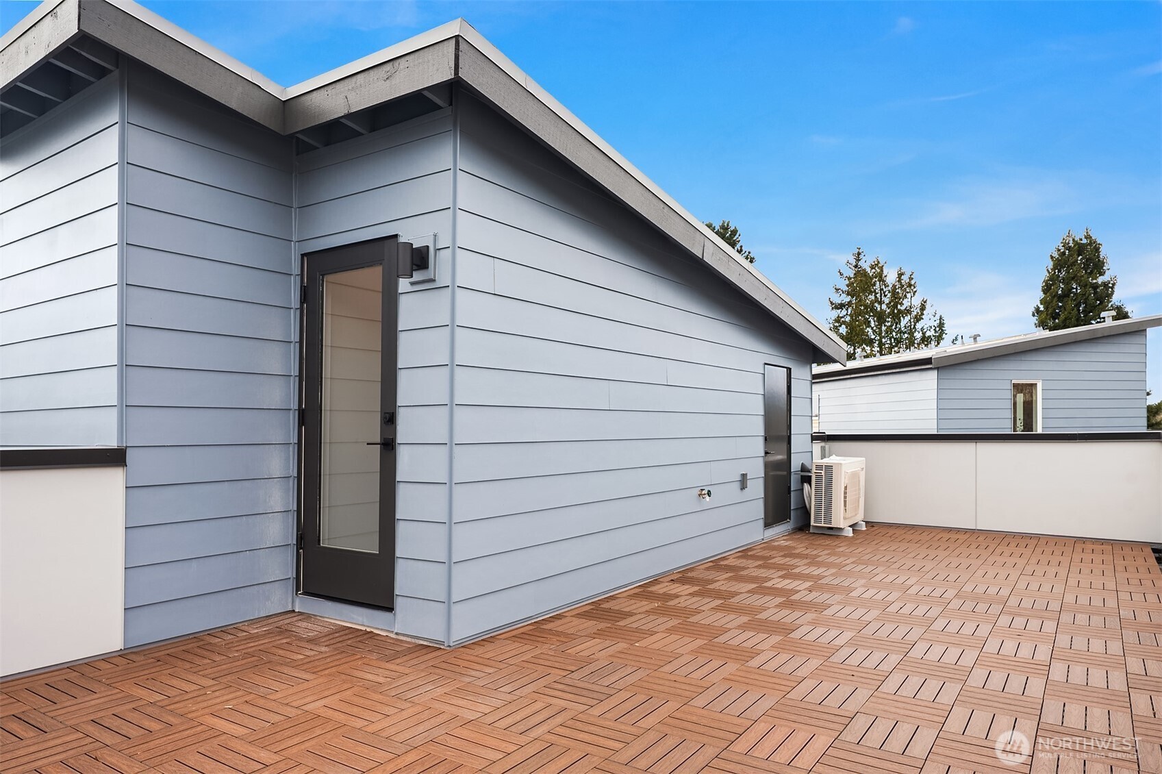 223 Northeast 75th Street Seattle, WA 98115 - Photo 31 of 33 a view of a house with a garage