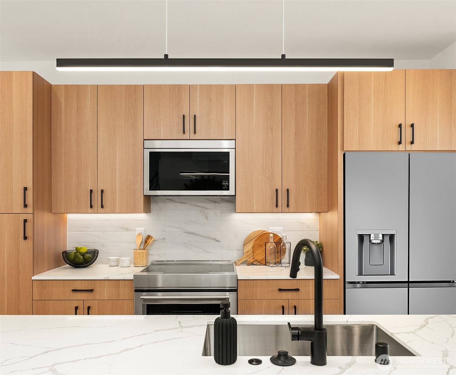 223 Northeast 75th Street Seattle, WA 98115 - Photo 6 of 33 a bathroom with a tub and sink