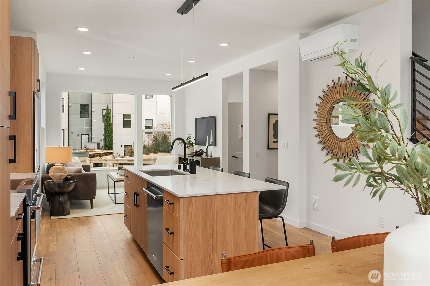 223 Northeast 75th Street Seattle, WA 98115 - Photo 7 of 33 a large white kitchen with a large window