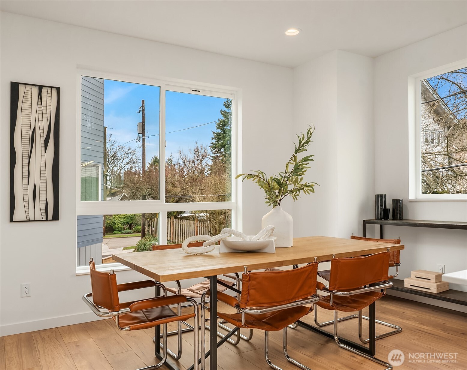 223 Northeast 75th Street Seattle, WA 98115 - Photo 9 of 33 a view of a dining room with furniture window and outside view