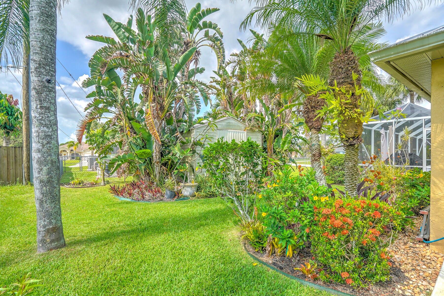 1829 Southwest Hickock Terrace Port St. Lucie, FL 34953 - Photo 6 of 62 Lush Landscaping