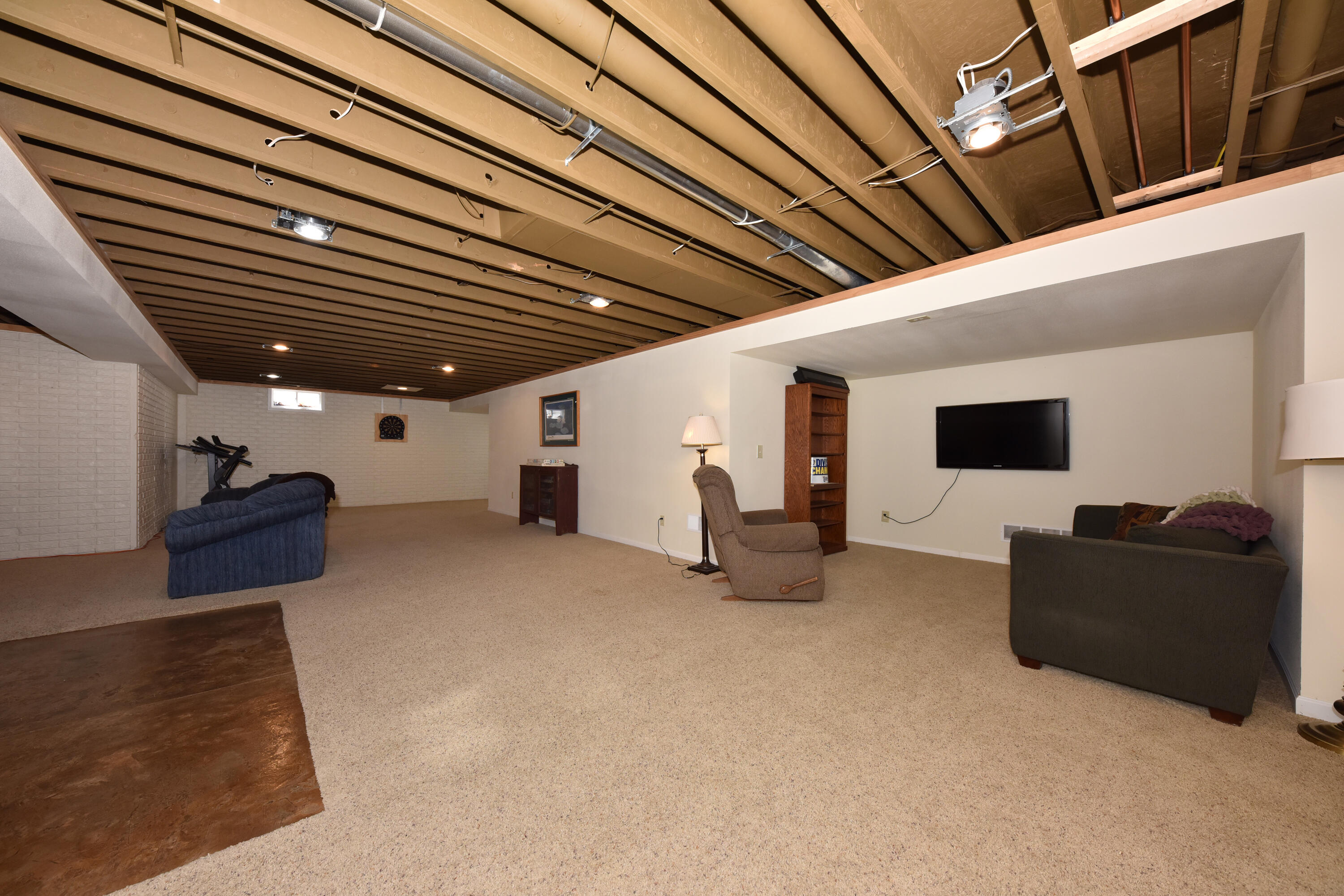 550 Hunter Crossing South Slinger, WI 53086 - Photo 19 of 31 Lower Level Rec Room