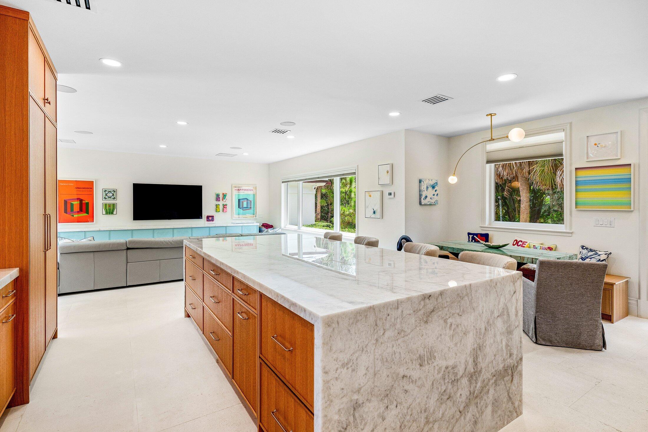 5 Osprey Court Ocean Ridge, FL 33435 - Photo 19 of 39 a large kitchen with stainless steel appliances a stove a sink a microwave and a refrigerator