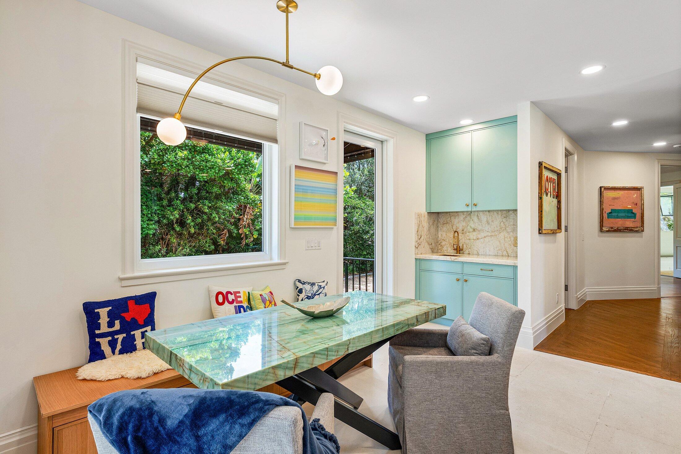 5 Osprey Court Ocean Ridge, FL 33435 - Photo 20 of 39 a living room with furniture and a large window